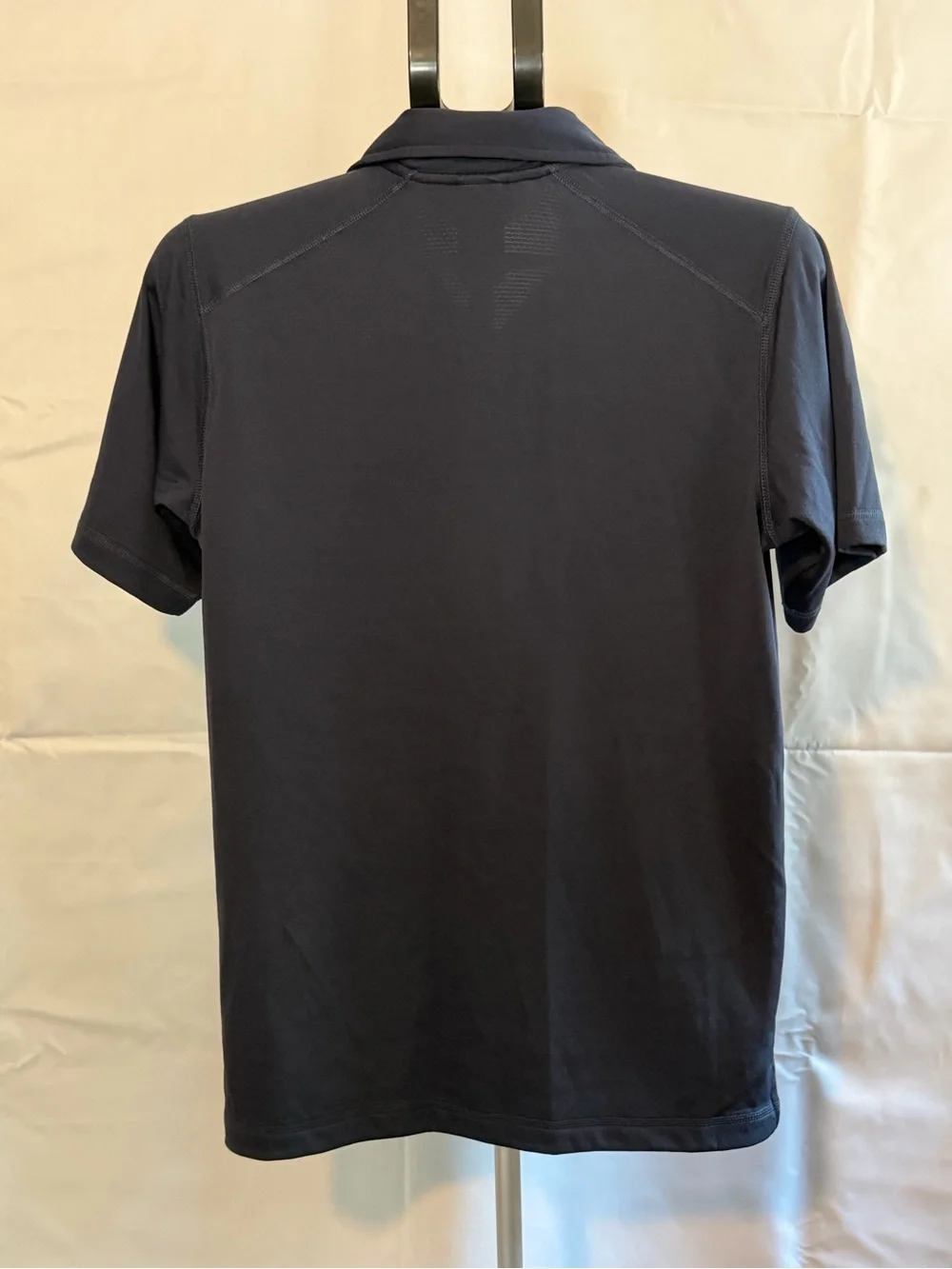 The North Face Men's Navy Polo with Red Logo